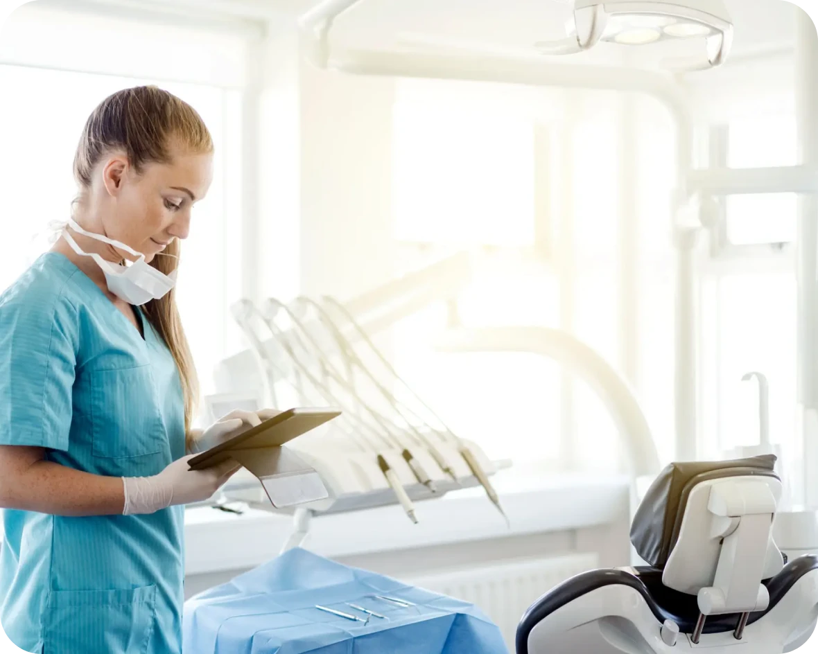 Dentist preparing for procedure