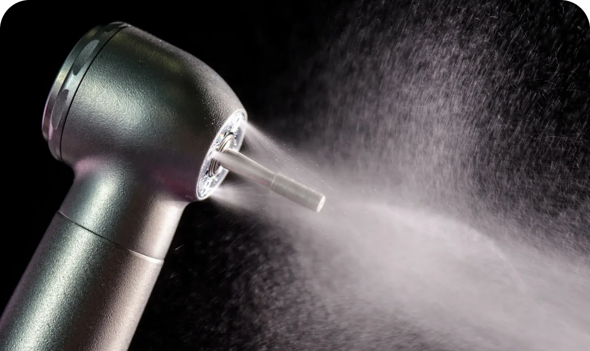 Close-up of dental drill spraying